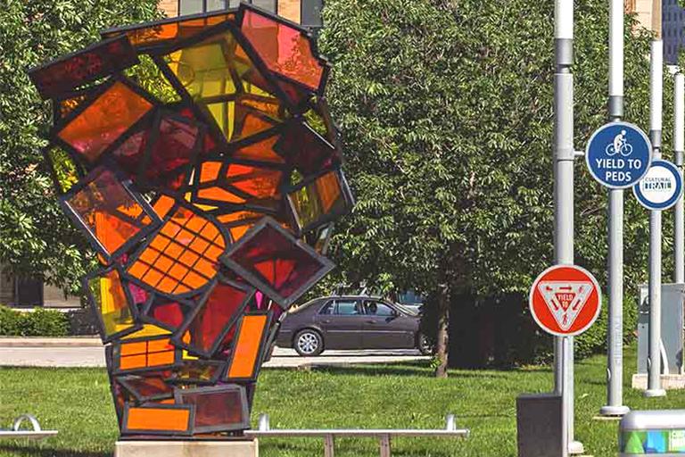 Red and orange translucent outdoor sculpture at IUPUI.